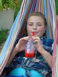 Young lady drinking Slush